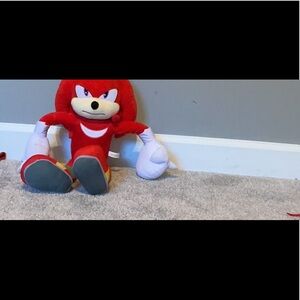 Red and White Plush Toy